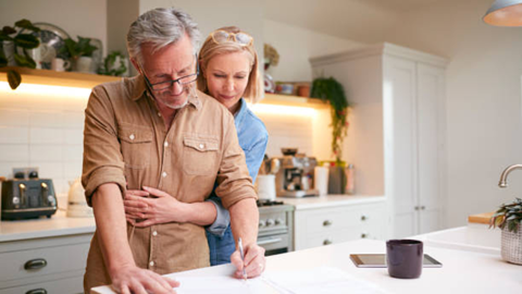 Couple stood in kitchen - Totally Life